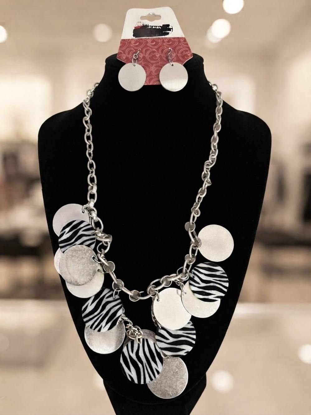 Charming Charlie Silver and Black Zebra Disc Necklace with Matching Earrings